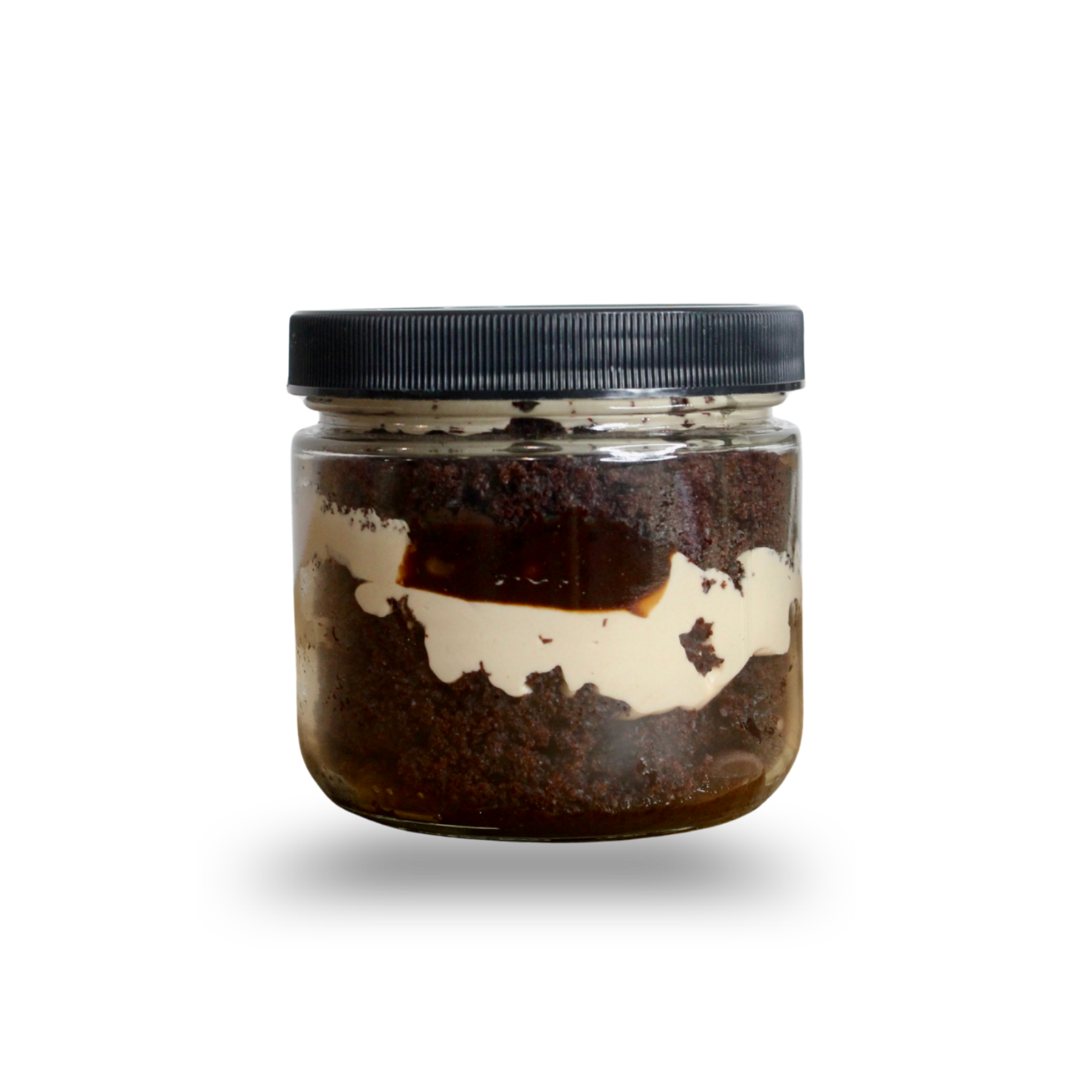 Jar with a black lid containing a dark brown substance on a white background